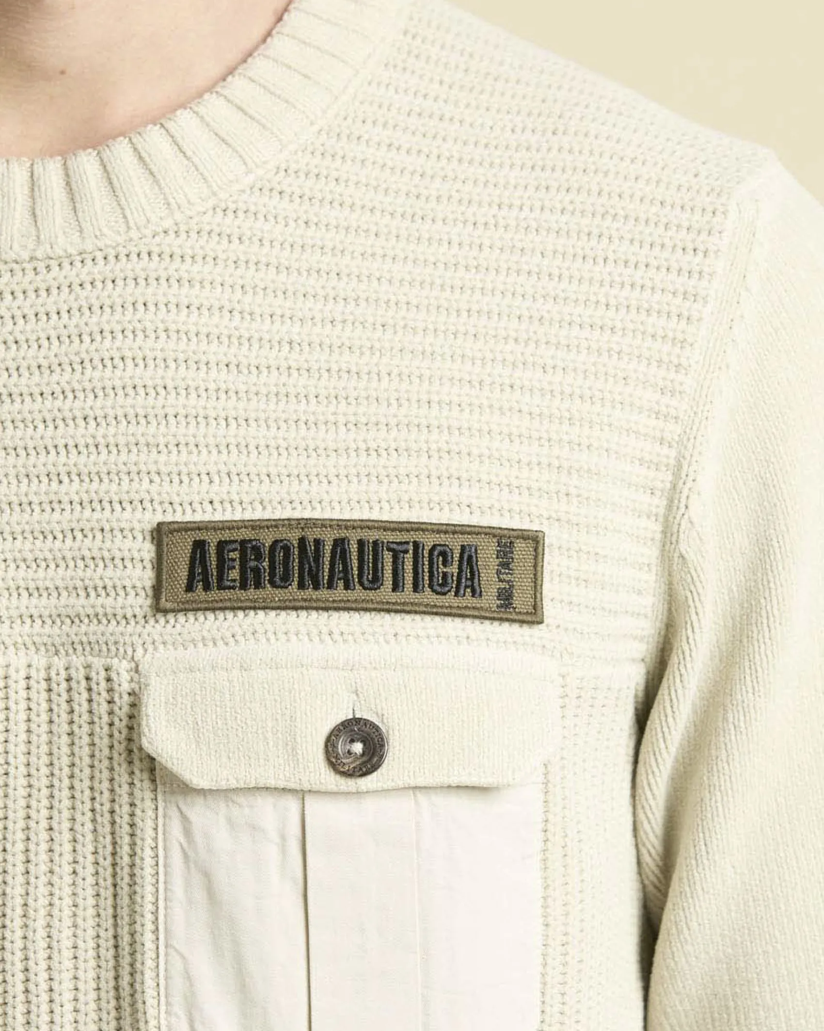 Maglia girocollo Aeronautica Militare color panna in ciniglia con taschino al petto