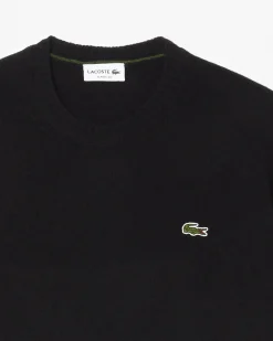 Maglia girocollo Lacoste nera in lambswool di pura lana