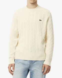 Maglia girocollo Lacoste color panna in lambswool di pura lana lavorata a trecce