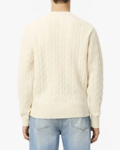 Maglia girocollo Lacoste color panna in lambswool di pura lana lavorata a trecce