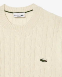 Maglia girocollo Lacoste color panna in lambswool di pura lana lavorata a trecce