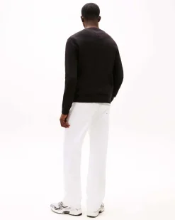 Maglia girocollo Tommy Jeans nera in puro cotone con logo flag piccolo ricamato sul petto