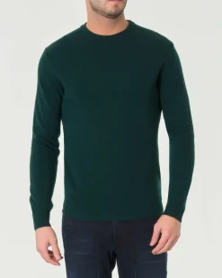 Maglia girocollo Woolrich verde scuro in lambswool di pura lana con logo ricamato sul polso