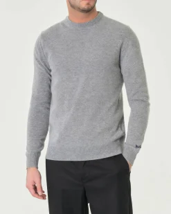Maglia girocollo Woolrich grigio chiaro in lambswool di pura lana con logo ricamato sul polso