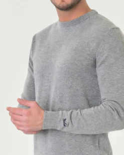 Maglia girocollo Woolrich grigio chiaro in lambswool di pura lana con logo ricamato sul polso