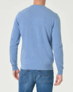 Maglia girocollo Woolrich azzurra in lambswool di pura lana con logo ricamato sul polso
