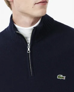 Maglia Lacoste blu in lambswool di pura lana a collo alto e apertura a mezza zip
