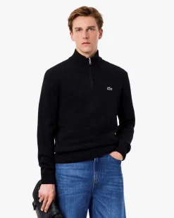 Maglia Lacoste nera in lambswool di pura lana a collo alto e apertura a mezza zip