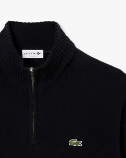 Maglia Lacoste nera in lambswool di pura lana a collo alto e apertura a mezza zip