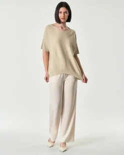 Maglia over color oro in misto viscosa con inserti in lurex e maniche al gomito
