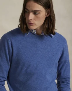 Maglia Polo Ralph Lauren celeste in pura lana con scollo a giro e logo pony in tono ricamato sul petto