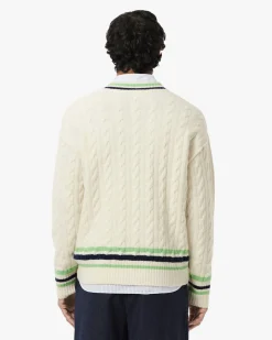 Maglione Lacoste panna in lana a trecce con scollo a V e righe in contrasto