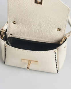 Mini bag Visonà bianca in pelle martellata con impunture e patta di chiusura in cavallino effetto dalmata