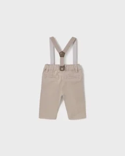Pantalone beige in cotone stretch con bretelle