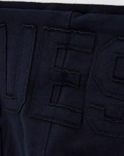 Pantalone Guess jogger blu e bianco in misto cotone