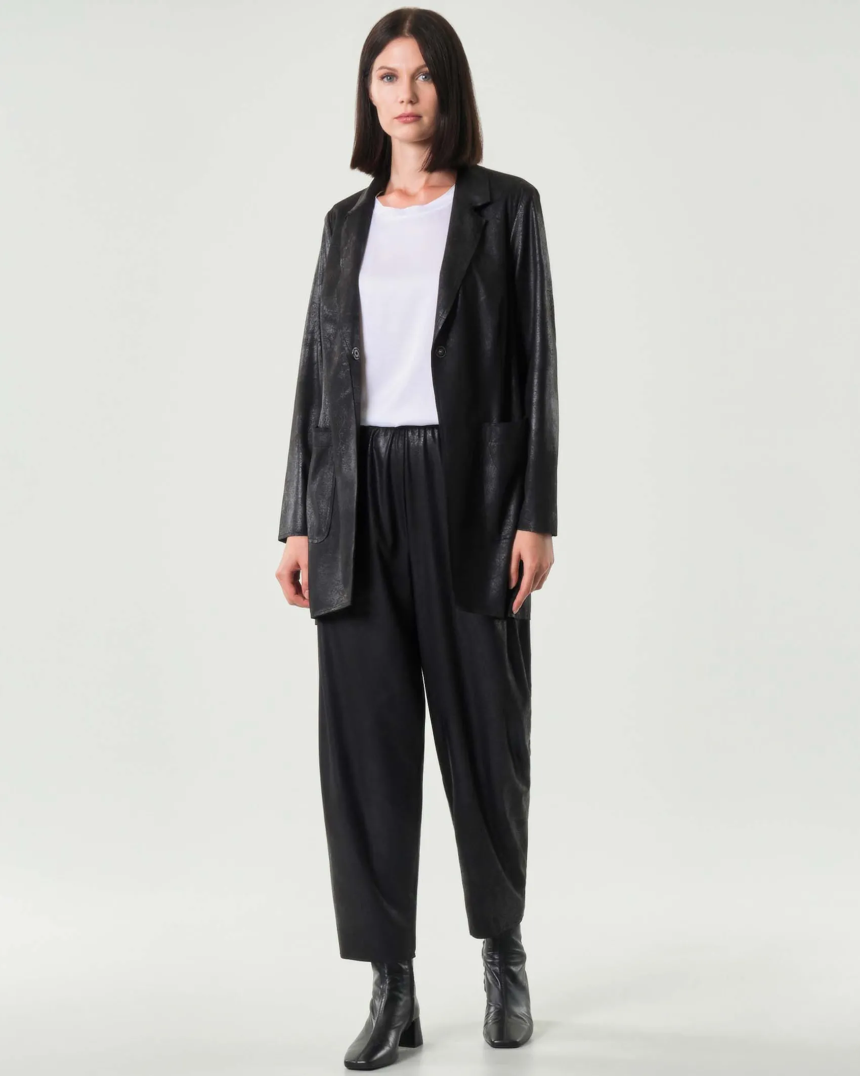 Pantaloni a pallocino neri Jurerê in tessuto spalmato stretch effetto cangiante con elastico inserito in vita
