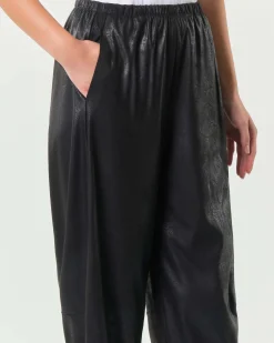 Pantaloni a pallocino neri Jurerê in tessuto spalmato stretch effetto cangiante con elastico inserito in vita