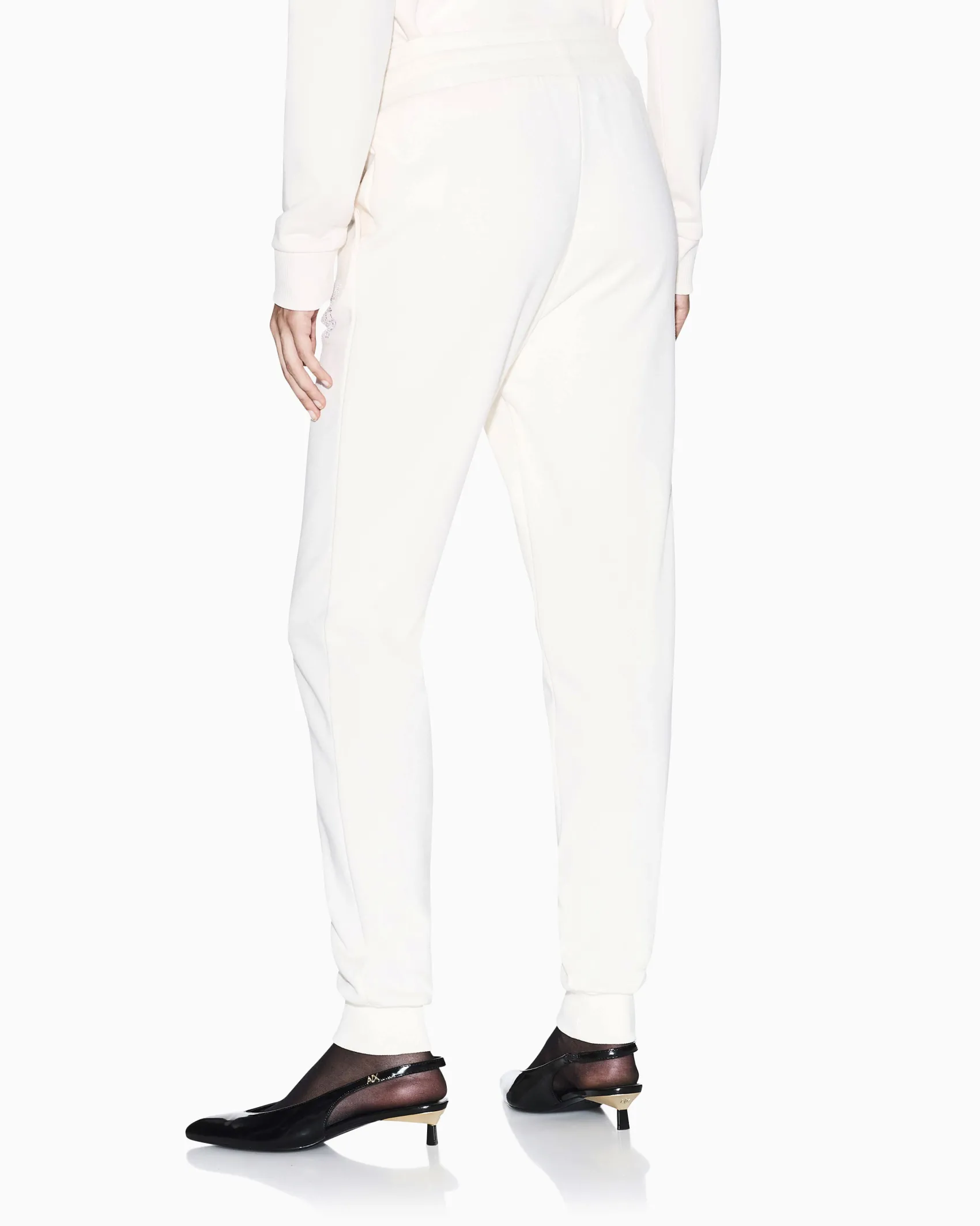 Pantaloni Armani Exchange bianchi in cotone con dettagli in maglia
