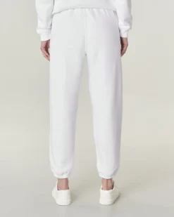 Pantaloni bianchi in felpa di cotone con elastico inserito nei polsini e in vita