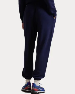 Pantaloni blu in felpa di cotone garzato con elastico al fondo e logo rosso ricamato