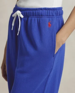 Pantaloni blu royal in felpa di cotone garzato con elastico al fondo e logo rosso ricamato
