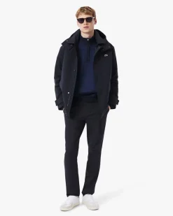 Pantaloni chino Lacoste blu in tessuto tecnico elasticizzato