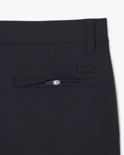 Pantaloni chino Lacoste blu in tessuto tecnico elasticizzato