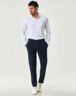 Pantaloni Genius Boss blu slim-fit in tessuto tecnico stretch