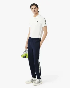 Pantaloni Lacoste blu in felpa di cotone con banda porta logo in contrasto