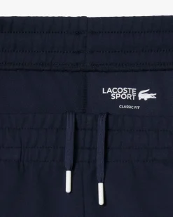 Pantaloni Lacoste blu in felpa di cotone con banda porta logo in contrasto