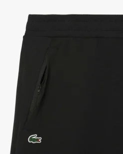 Pantaloni Lacoste neri in felpa di cotone con dettagli in mesh