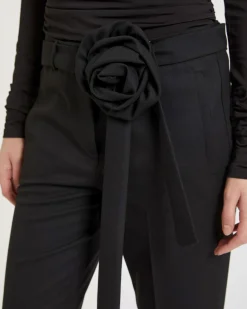 Pantaloni neri flare Marella in misto viscosa stretch con cintura rimovibile con fiore