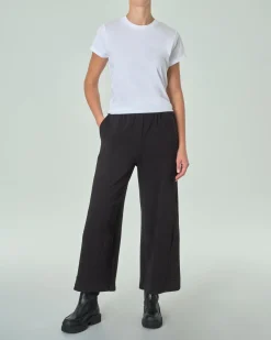 Pantaloni neri slim in misto viscosa punto Milano con risvolto al fondo ed elastico in vita