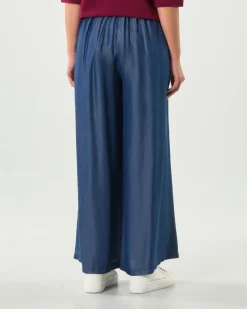 Pantaloni palazzo blu stone washed Hlo! in lyocell con pinces in vita ed elastico sul retro