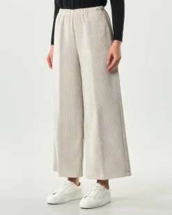 Pantaloni super wide neri Jurerê in velluto stretch a coste con elastico inserito in vita