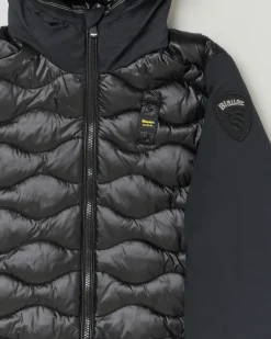 Piumino Blauer nero in nylon trapuntato a onde con cappuccio e maniche in soft shell