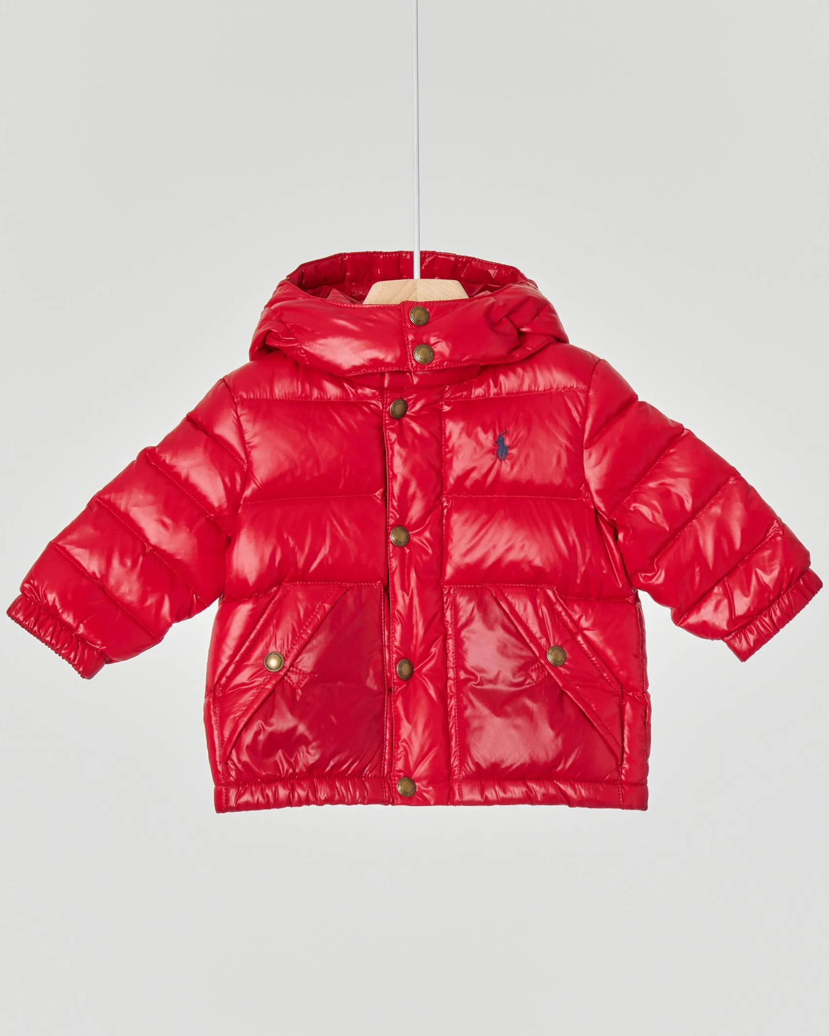 Piumino Polo Ralph Lauren rosso con cappuccio staccabile e doppia chiusura zip e bottoni