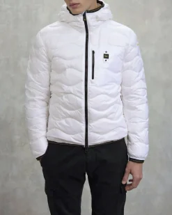 Piumino Wave Blauer bianco con cappuccio fisso e trapuntatura ad onde