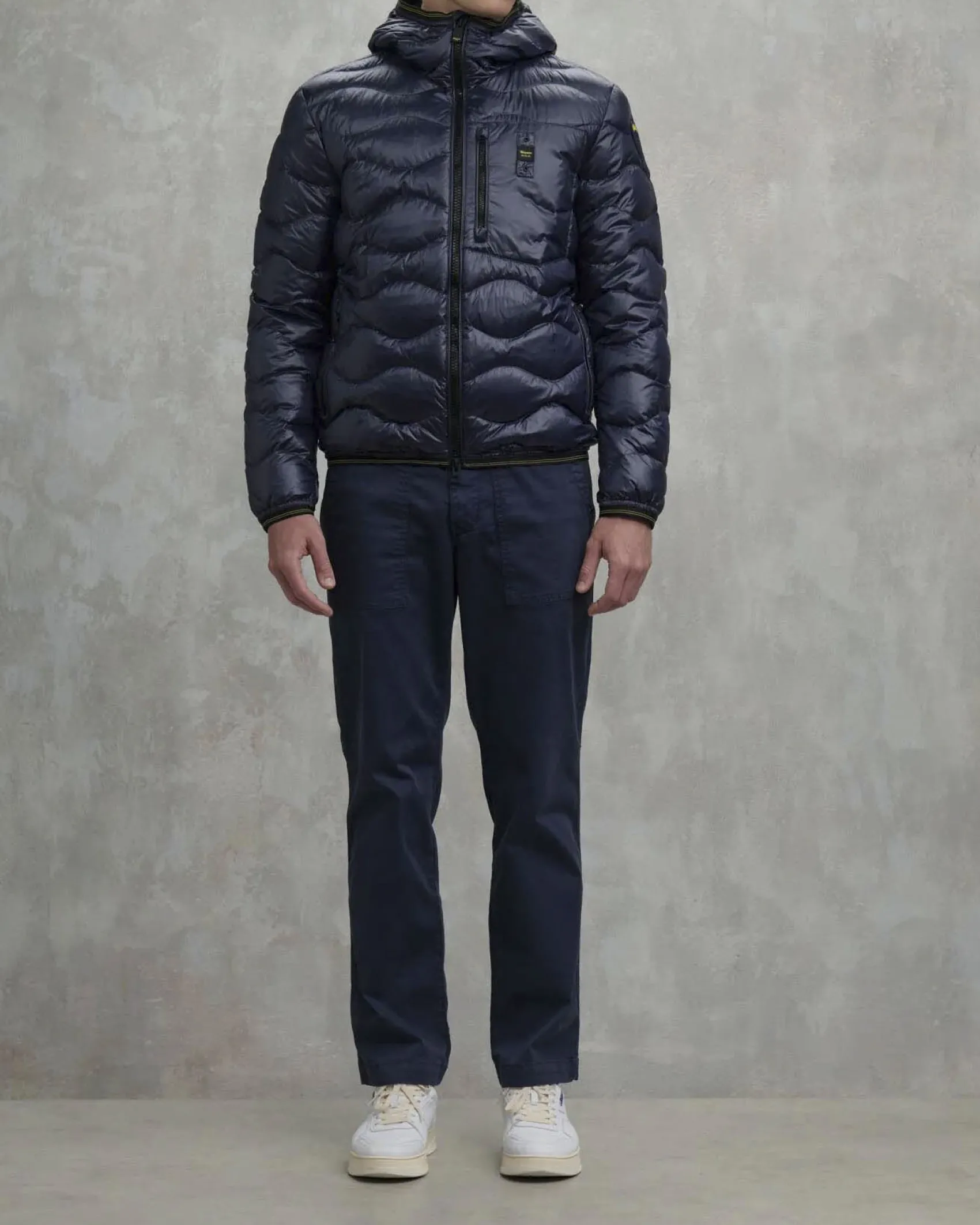 Piumino Wave Blauer blu con cappuccio fisso e trapuntatura ad onde