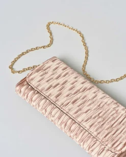 Pochette a busta Anna Cecere rosa cipria con strass tono su tono applicati sulla patta di chiusura