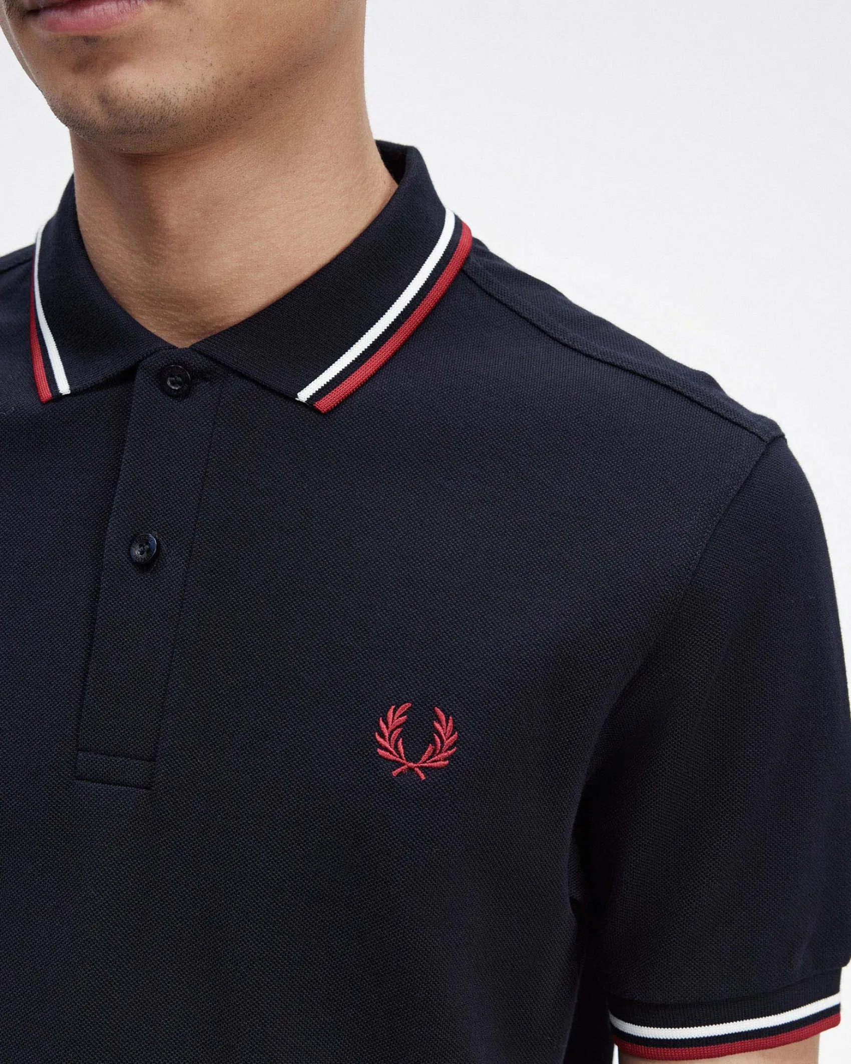 Polo blu mezza manica con bordino bianco e rosso