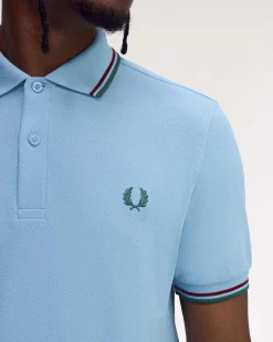 Polo Fred Perry azzurra mezza manica con bordino verde e bordeaux