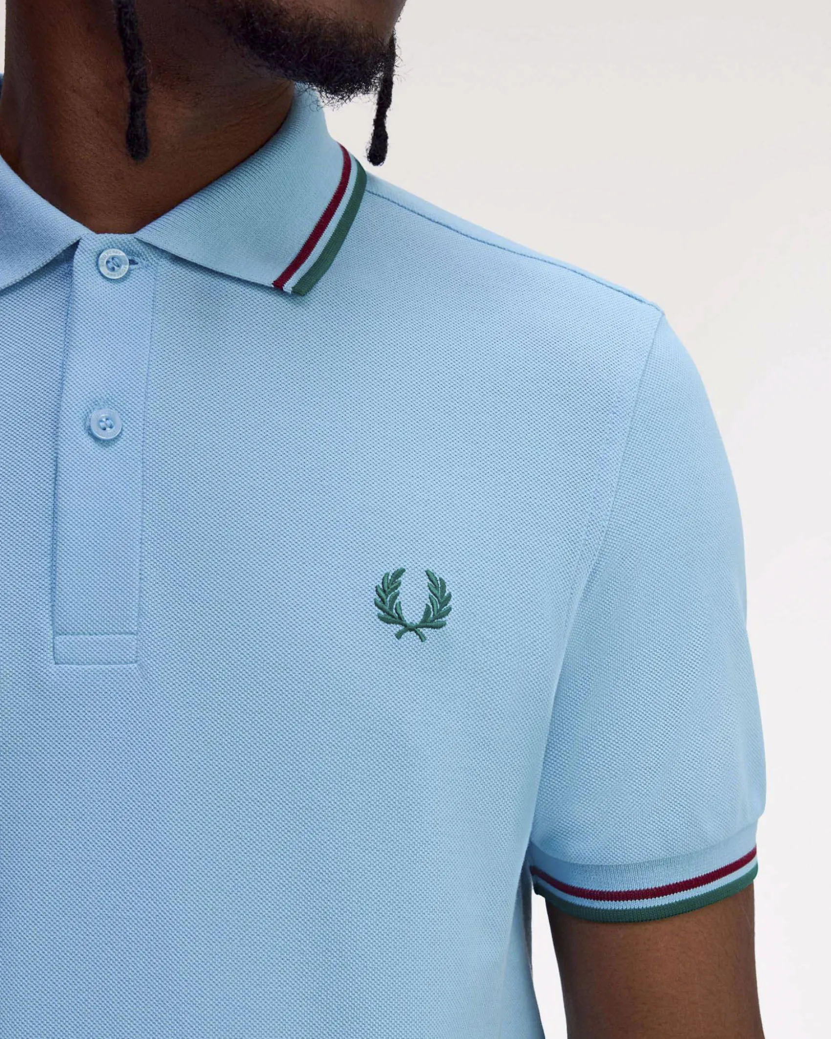 Polo Fred Perry azzurra mezza manica con bordino verde e bordeaux