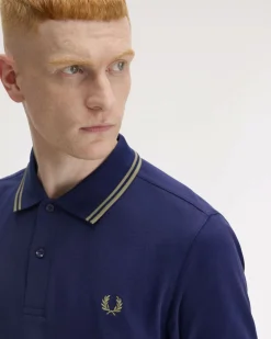 Polo Fred Perry blu indaco mezza manica con bordino verde salvia