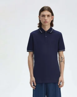 Polo Fred Perry blu indaco mezza manica con bordino blu e argento