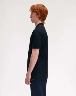 Polo Fred Perry blu mezza manica con bordino rosso e verde