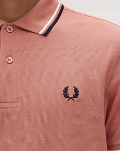 Polo Fred Perry rosa antico mezza manica con bordino blu e bianco
