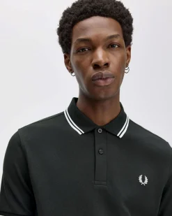 Polo Fred Perry verde scuro mezza manica con bordino bianco