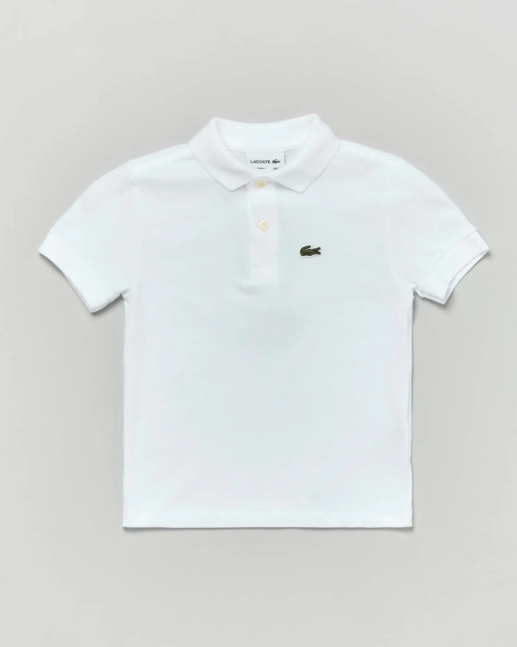 Polo Lacoste bianca piqué di puro cotone