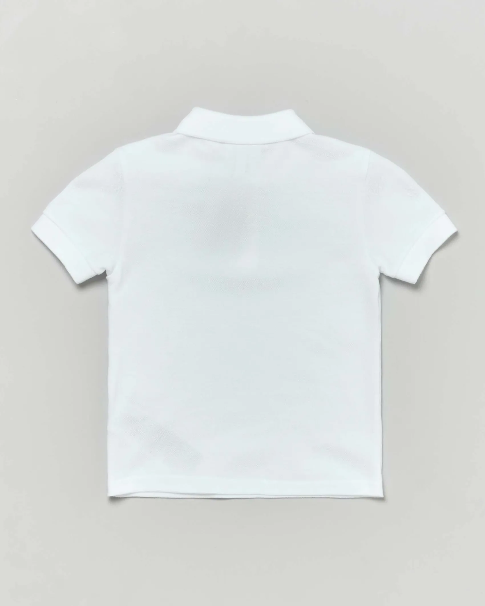 Polo Lacoste bianca piqué di puro cotone